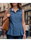 Tunique en jean bleu pour femme de la marque Axone modèle Denim-Confort avec col boutonné et deux poches poitrine.