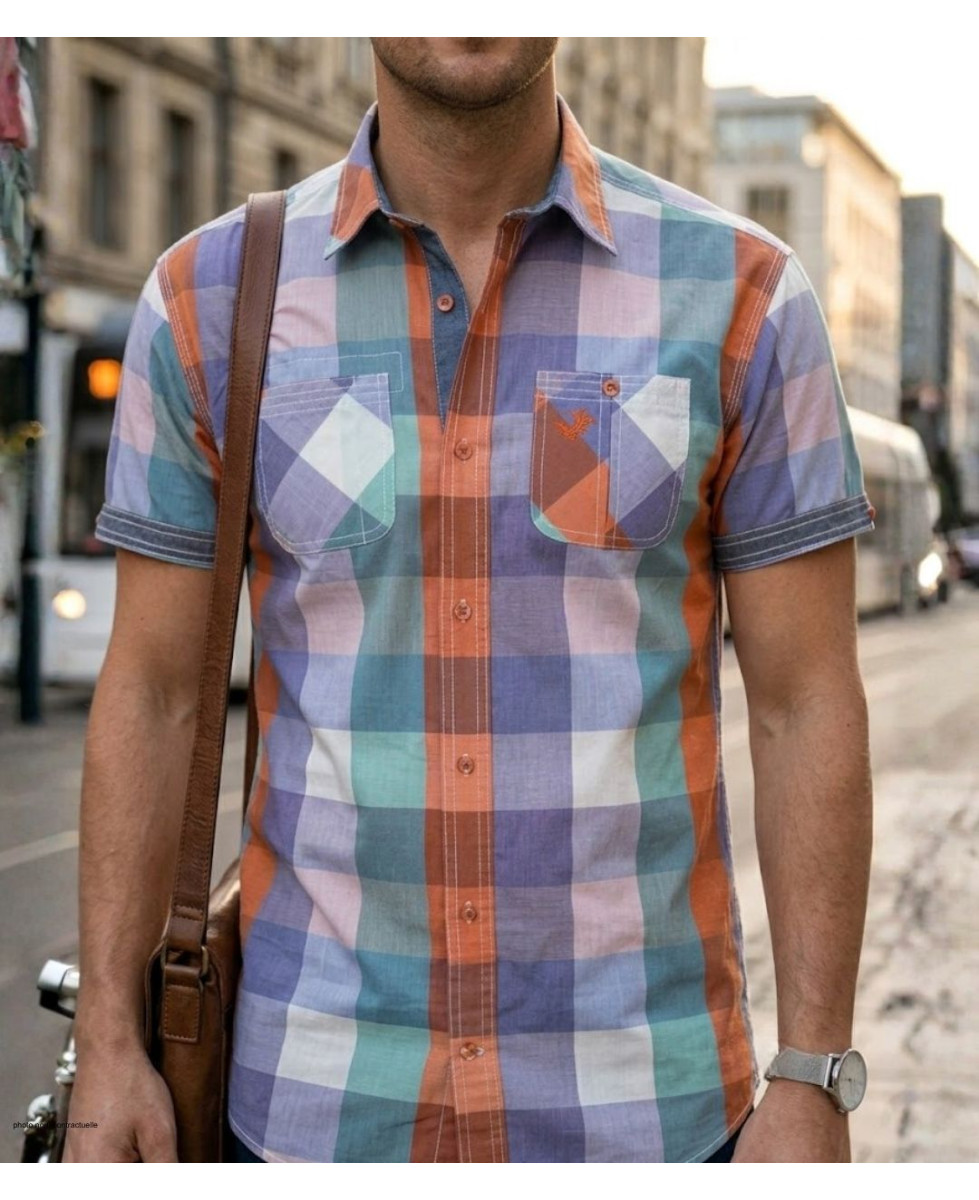 Chemise manches courtes pour homme WINCHESTER modèle TAHITI2 coloris orange et bleu avec deux poches poitrine.