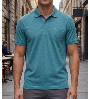 Polo manches courtes CHALLENGER modèle RUSTICO5 coloris bleu turquoise chiné en maille piquée de coton avec poche poitrine.